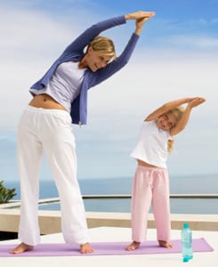 Magnesium for Girls & Women - a photo of a mother and little daughter exercising 